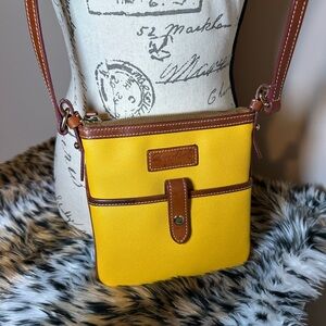 Dooney & Bourke Pebble Grain Crossbody Women's Bag in Marigold color.